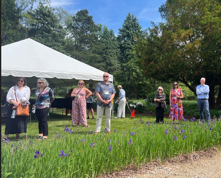 Guests enjoying remarks at the Schweikher House